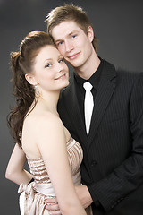 Image showing Portrait of a young beautiful couple embracing.