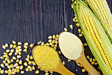 Image showing Flour and grits corn in spoons on wooden board