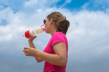 Image showing Woman drinking clean water