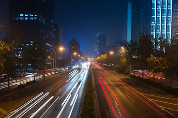 Image showing Light trails on motorway highway at night