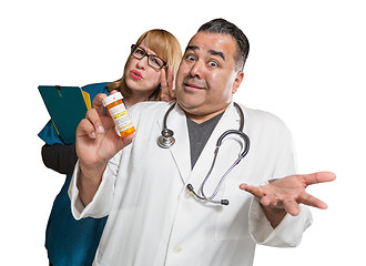 Image showing Goofy Doctor and Nurse with Prescription Bottle Isolated on a Wh