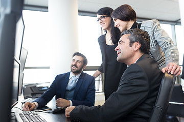 Image showing Business team working in corporate office.