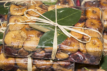 Image showing Dried figs in cellophane as a gift package