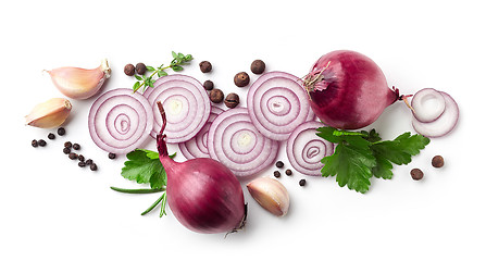 Image showing red onions, garlic and various spices on white background