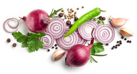 Image showing red onions, garlic and various spices on white background