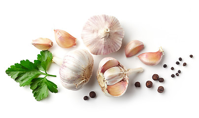 Image showing garlic, parsley and pepper on white background