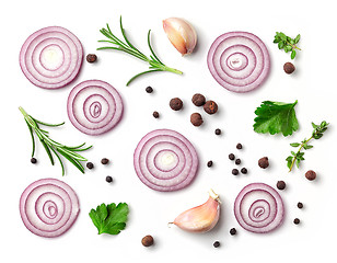 Image showing red onion and spices on white background