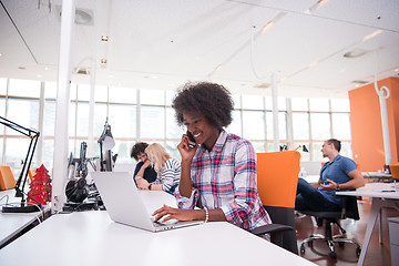 Image showing African American informal business woman working in the office