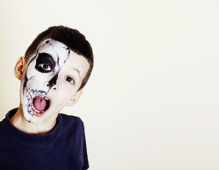 Image showing little cute boy with facepaint like skeleton to celebrate hallow