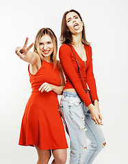 Image showing best friends teenage girls together having fun, posing emotional on white background, besties happy smiling, lifestyle people concept 