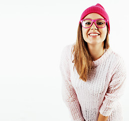 Image showing young pretty teenage hipster girl posing emotional happy smiling on white background, lifestyle people concept