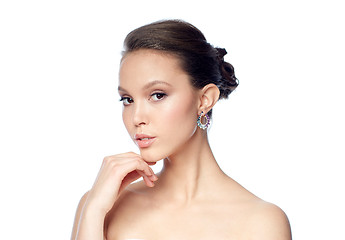 Image showing close up of beautiful woman face with earring