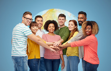 Image showing international group of happy people holding hands