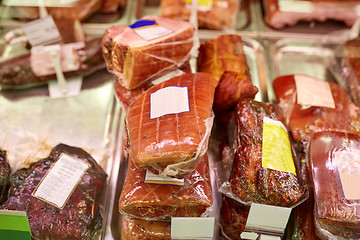 Image showing ham at grocery store stall