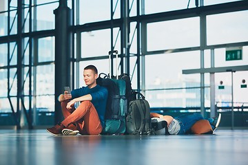 Image showing Travelers waiting for departure