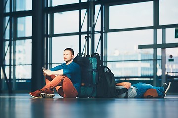 Image showing Travelers waiting for departure