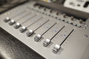 Image showing music mixing console at sound recording studio