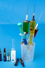 Image showing Syringes and ampoules