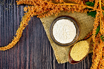 Image showing Flour amaranth in bowl with spoon and flower on board top