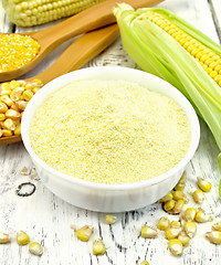 Image showing Flour corn in bowl with cobs on board