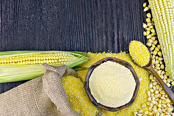 Image showing Flour and grits corn with bag on wooden board