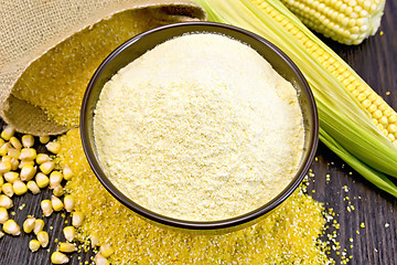 Image showing Flour corn in bowl with grits and cob on dark board
