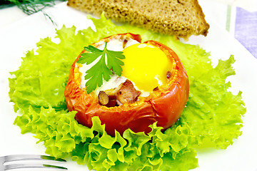 Image showing Scrambled eggs in tomato and bread on board