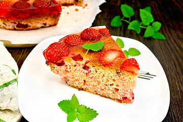 Image showing Pie strawberry with jelly in white plate on board