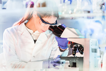 Image showing Life science researcher microscoping in genetic scientific laboratory.