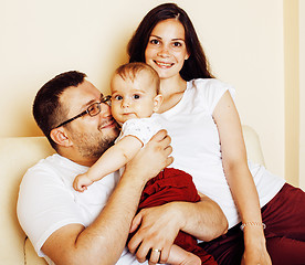 Image showing young happy modern family smiling together at home. lifestyle pe