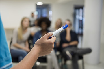 Image showing close up of teacher hand with marker