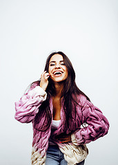 Image showing young happy smiling latin american teenage girl emotional posing on white background, lifestyle people concept