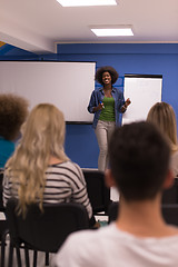 Image showing Black woman Speaker Seminar Corporate Business Meeting Concept