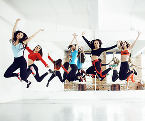 Image showing Women doing sport in gym, healthcare lifestyle people concept, modern loft studio close up