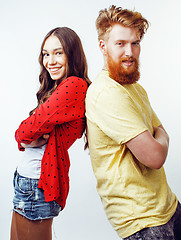 Image showing young pretty teenage couple, hipster guy with his girlfriend happy smiling and hugging isolated on white background, lifestyle people concept 