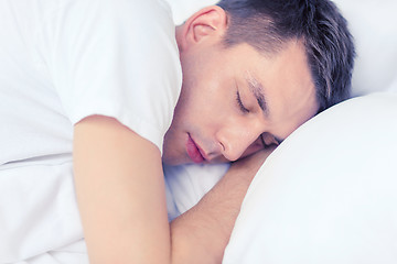 Image showing handsome man sleeping in bed