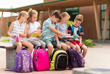 Image showing group of happy elementary school students outdoors