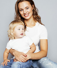 Image showing mother with daughter together on white background happy smiling, cute family close up, lifestyle people concept, cool real modern woman isolated