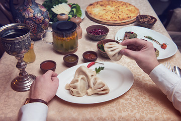 Image showing Man eating in georgian restaurant