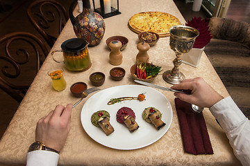 Image showing Man eating in georgian restaurant