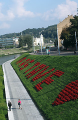 Image showing editorial Neris river with pedestrian walkway and bicycle path i