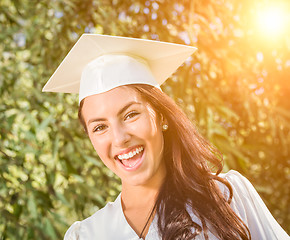 Image showing Happy Graduating Mixed Race Girl In Cap and Gown