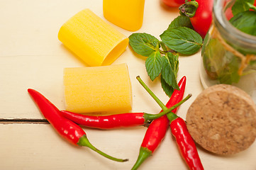 Image showing Italian pasta paccheri with tomato mint and chili pepper