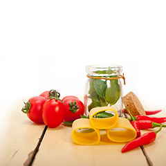 Image showing Italian pasta paccheri with tomato mint and chili pepper