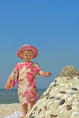 Image showing Little girl on a sea beach