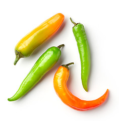 Image showing various chili peppers on white background