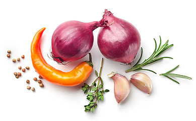 Image showing red onions and spices on white background