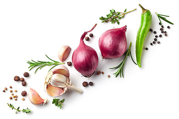 Image showing red onions and spices on white background