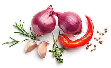 Image showing red onions and spices on white background