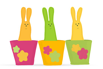 Image showing Multicolored easter bunnies sitting in row